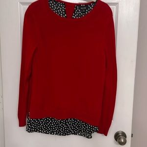 Red sweater with black and white polka dot lining. Size PXL.